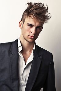 Elegant young handsome man. Studio fashion portrait.